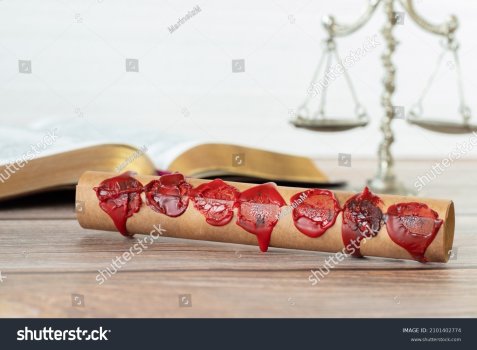 stock-photo-a-closeup-of-an-ancient-closed-scroll-with-seven-seals-on-a-wooden-table-with-holy...jpg
