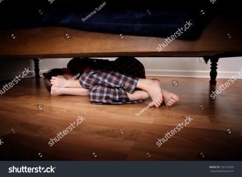 stock-photo-fearful-boy-hiding-under-the-bed-126132929.jpg