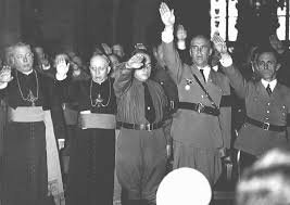 Catholic clergy and Nazi officials give the Nazi salute ...