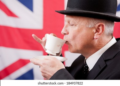 english-gentleman-drinking-tea-260nw-184937822.jpg