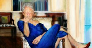 Clinton-in-blue-dress-300x157.jpg