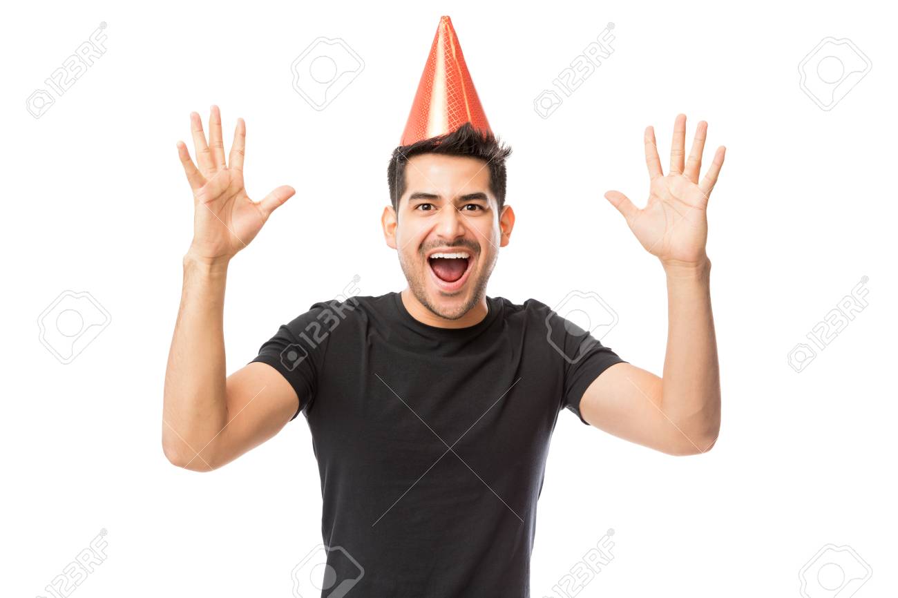 108973964-portrait-of-young-man-wearing-party-hat-while-enjoying-birthday-party-on-white-background.jpg