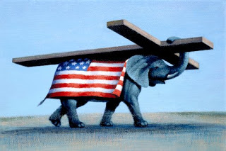 view-of-an-elephant-wearing-an-american-flag-carrying-a-cross2.jpg
