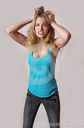woman-despair-young-pulling-her-hair-50935494.jpg