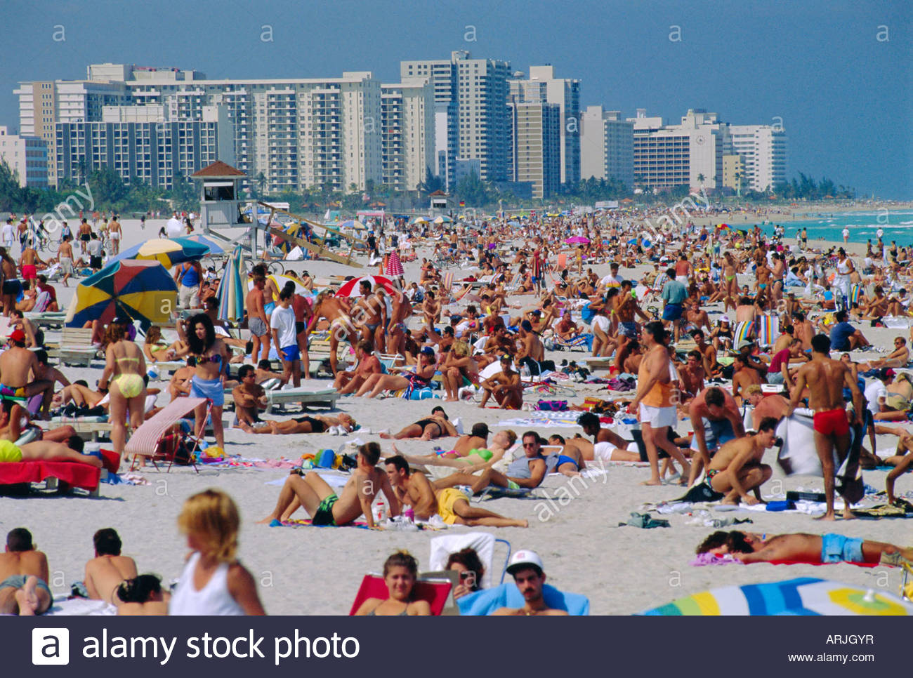 crowded-beach-miami-beach-florida-usa-ARJGYR.jpg