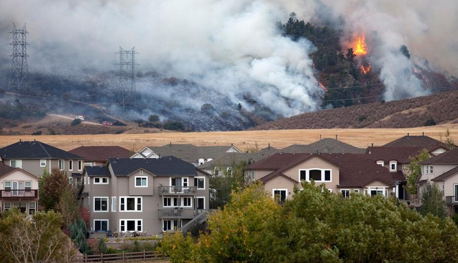 burning pine and scrub oak trees emit toxic wildfire smoke near residential homes