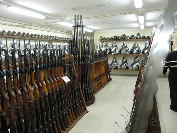SIG-MKPO-subguns-on-bottom-left-and-MP43-44s-top-left-ready-to-go-in-the-Swiss-Guards-armory-note-the-two-handed-swords-to-the-right.jpg