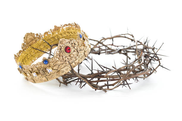 crown-of-thorns-and-a-gold-crown-on-a-white-background-picture-id1296793488