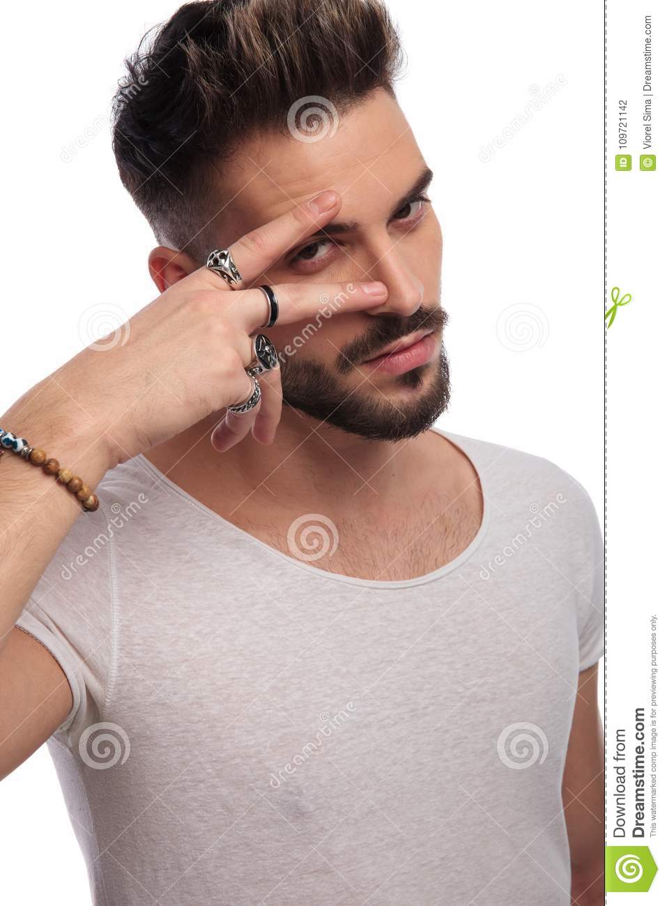 sexy-man-holding-fingers-his-eye-sexy-man-holding-fingers-his-eye-making-peace-sign-white-background-109721142.jpg